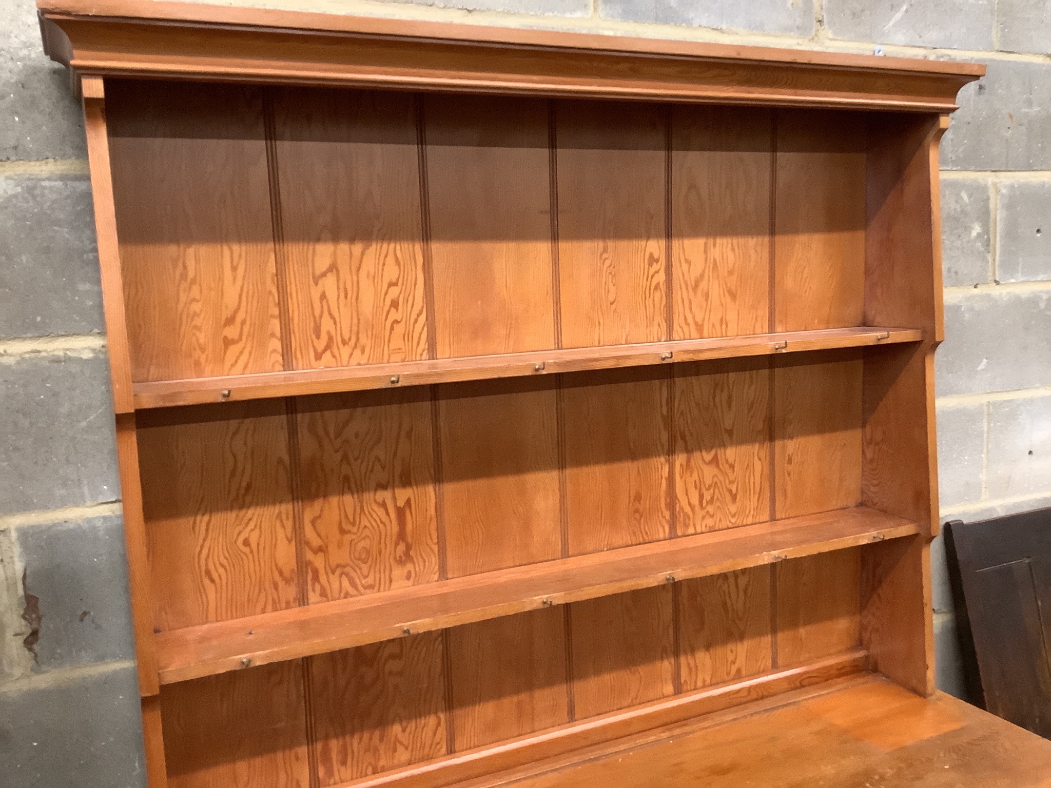 A Victorian style pitch pine dresser, length 139cm, depth 51cm, height 198cm